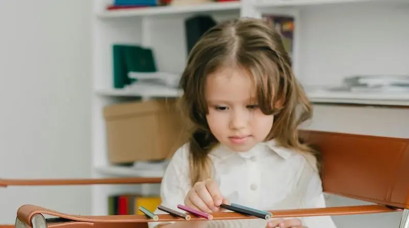 Child focused on an activity.